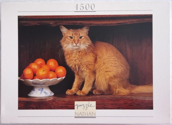 Image of the puzzle 1500, Nathan, A Cat with Oranges, by Gérard Lacz, Sealed Bag, Picture of the box