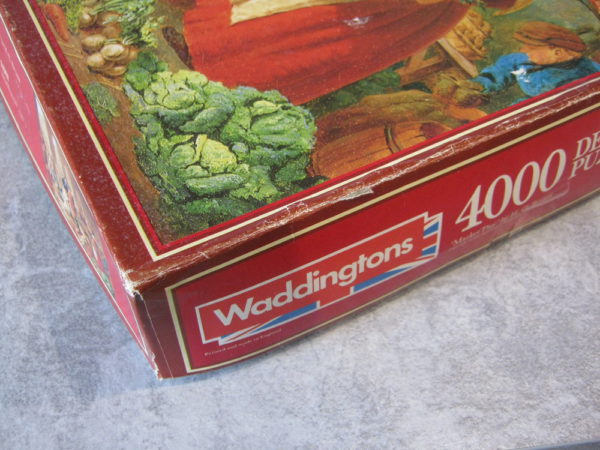Image of the puzzle 4000, Waddingtons, Market Day, Henry Charles Bryant, Sealed Bag, Picture of the corner