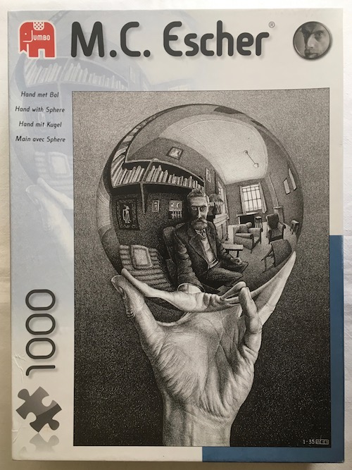 Image of the Puzzle 1000, Jumbo, Hand with Globe, Sealed Bag, Picture of the Box