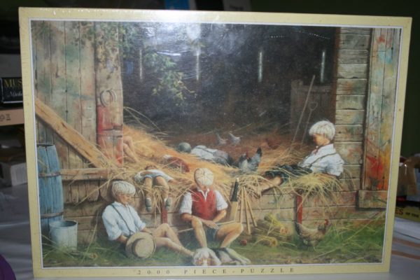 Image of the puzzle 2000, JR Puzzles, Heads Down, by Spencer Coleman, Factory Sealed, Listed by Cathy