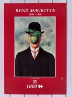 Image of the puzzle Jumbo manufactured this very rare puzzle in 1997. The title is The Great War, by René Magritte, Sealed Bag, Picture of the box