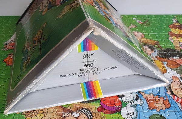 Image of the puzzle 500, Heye, Just Married, Jean-Jacques Loup. Picture of the corner of a box.
