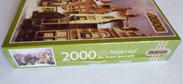 Image of the puzzle 2000, Falcon, A Dutch Street - Winter, Willem Koekkoek. Picture of the side of the box.