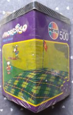 Image of the puzzle 500, Heye, Scotch Green, Guillermo Mordillo. Picture of the box.