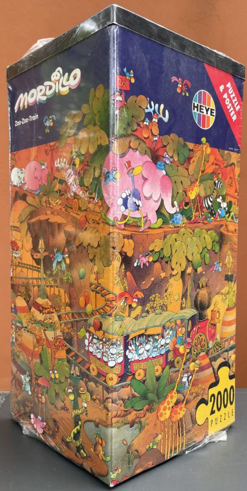 2000, Heye, Zoo-Zoo-Train, Guillermo Mordillo. Listed by Pietro. Image of the puzzle 2000, Heye, Zoo-Zoo-Train, Guillermo Mordillo. Picture of the box.