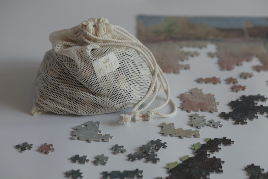 Image of a puzzle bag with pieces