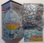 Image of the puzzle 2000, Heye, Futura, Guillermo Mordillo. Picture of the contents of the box.