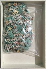 Image of the puzzle 1000, International Team, Design Puzzle, Gianni Pegoraro, by Gianni Pegoraro, Complete, Picture of the bag