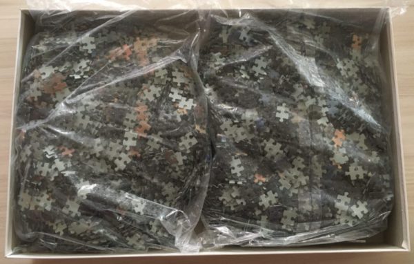 Image of the puzzle 6000, Schmidt, Mask in Blue, Joy Caros, Sealed Bag, Picture of the bag
