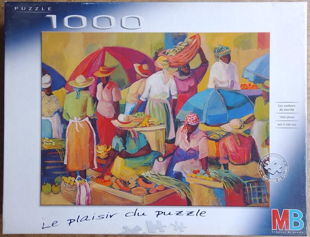 1000, MB, The Colors of the Market, by Vanita Comissiong, Incomplete, 2020-08-08 Image of the puzzle 1000, MB, The Colors of the Market, by Vanita Comissiong, Incomplete, Picture of the box
