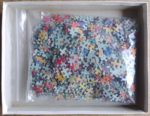 Image of the puzzle 1000, MB, The Colors of the Market, by Vanita Comissiong, Incomplete, Picture of the bag