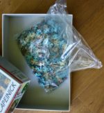 Image of the puzzle 1000, Ricordi, Still Life II with Tropical Palms, by Jean Capeinick, Sealed Bag, Picture of the bag