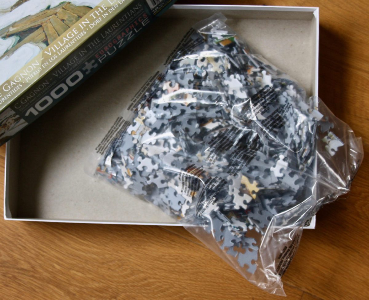 Image of the puzzle 1000, Eurographics, Village in the Laurentians, by Clarence Gagnon, Sealed Bag, Picture of the bag