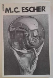 Image of the puzzle 1000, Selegiochi, Hand with Globe, Maurits Cornelis Escher, Sealed Bag, Picture of the box