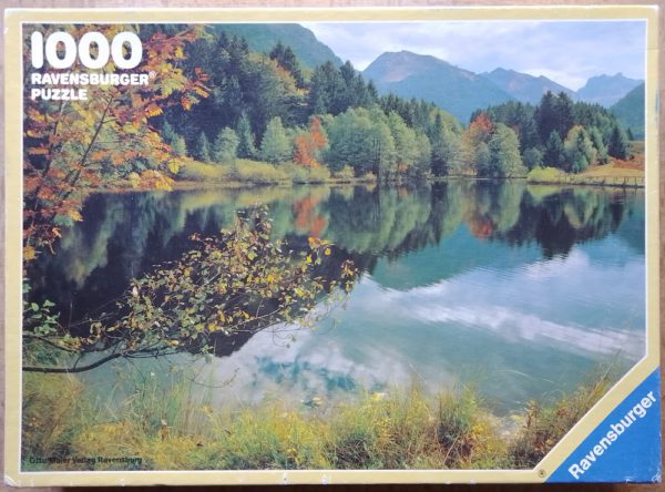 Image of the puzzle 1000, Ravensburger, Autumnal Atmosphere at the Lake, Complete, Picture of the box