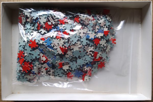 Image of the puzzle 1000, International Team, American Dollar, Complete, Picture of the bag