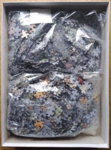 Image of the puzzle 1000x2, Jumbo, Playing Outside & Playing in the Rain, by Cornelis Jetses, Complete, Picture of the bag