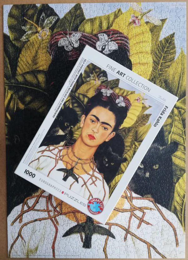 Image of the puzzle 1000, Eurographics, Self-Portrait with Thorn Necklace and Hummingbird, by Frida Kahlo, Picture of the box