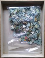 Image of the puzzle 750, Les Belles Images, Hiding in the Meadow, by Gerda Muller, Complete, Picture of the bag