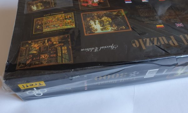 Image of the puzzle 3000, Trefl, Adam and Eve in the Garden of Eden, Savery. Picture of the corner of a box