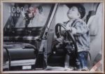 Image of the puzzle 1000, World Games, On the Car, by Kim Anderson, Complete, Picture of the box