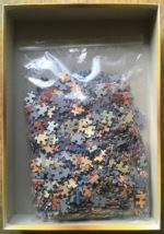 Image of the puzzle 1000, clementoni, Lady in Peach, by Helena Lam, Complete, Picture of the bag
