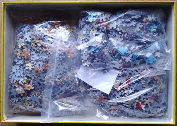Image of the puzzle 500-750-1000, Jumbo, Parcel Service & Break a Leg & Tennis, by Jan van Haasteren, Complete, Picture of the bag