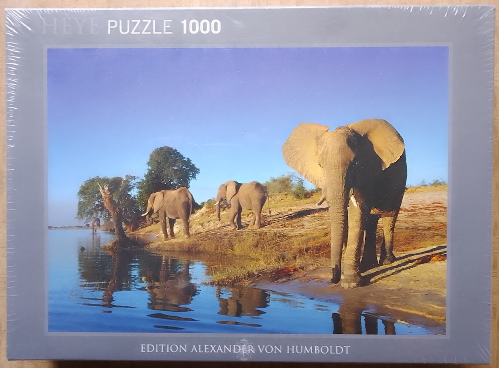 1000, Heye, Thirsty Elephants, by Richard du Toit, Factory Sealed Image of the puzzle 1000, Heye, Thirsty Elephants, by Richard du Toit, Picture of the box