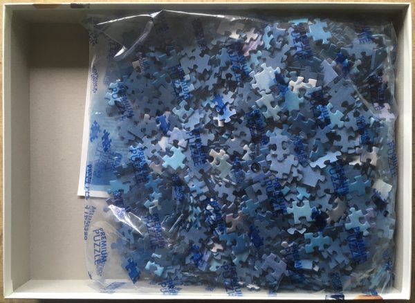 Image of the puzzle 1500, Ravensburger, Howl at the Moon, by Kentaro Nishino, Sealed Bag, Picture of the bag