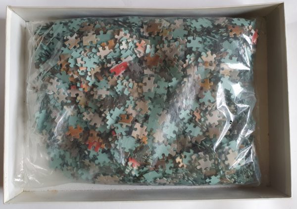 Image of the puzzle 3000, Jumbo, Circe as an Animal Queen, Barker. Picture of the bag with pieces puzzle