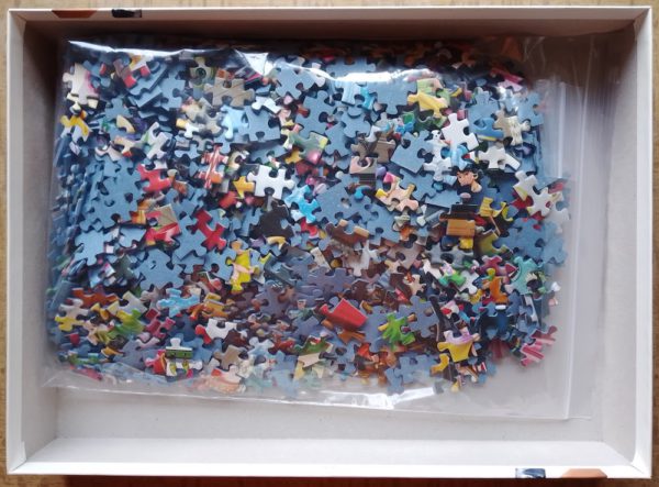 Image of the puzzle 1000, Ravensburger, Disney - All Aboard for Christmas!, Complete, Picture of the bag