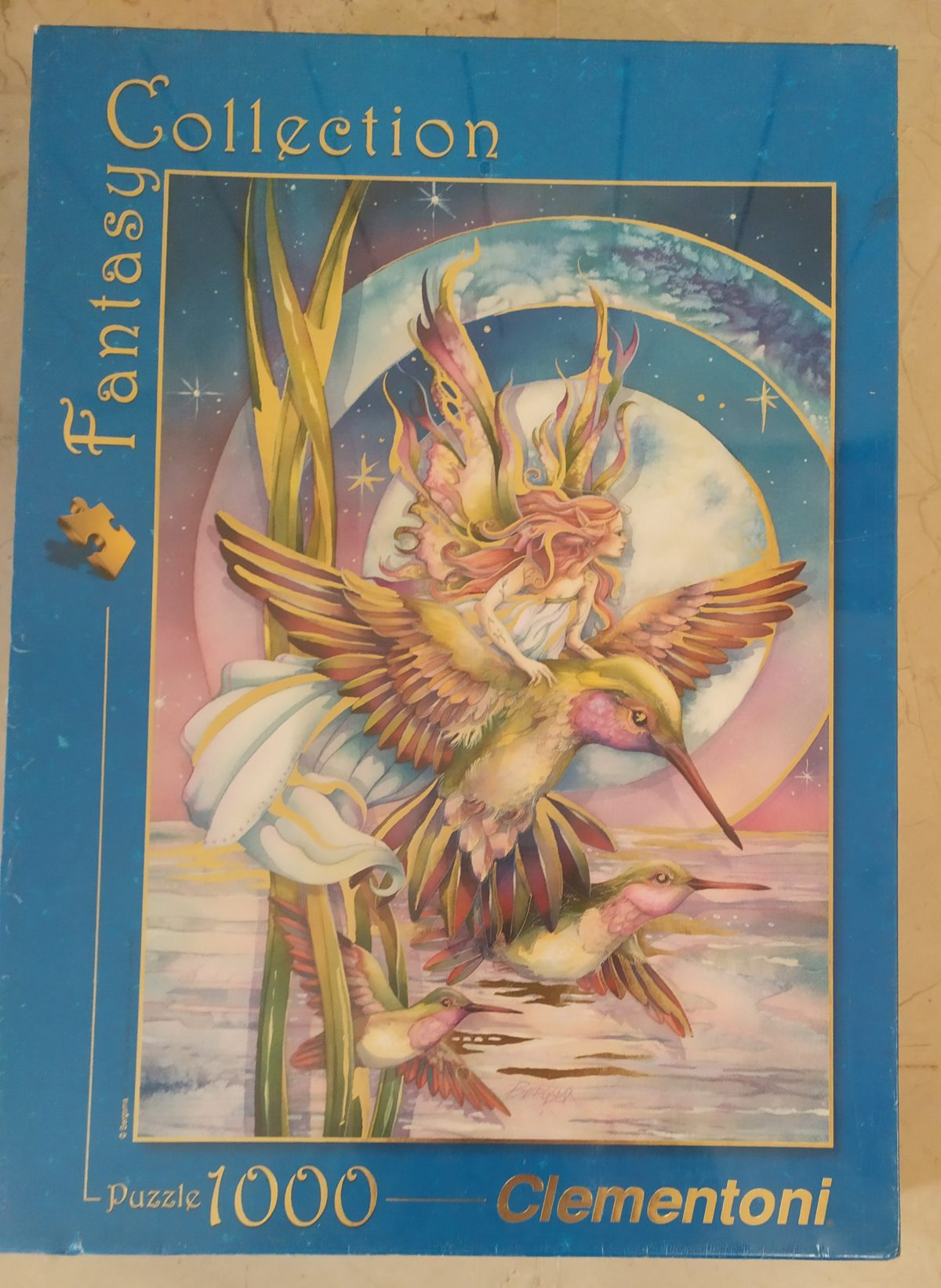 1000, Clementoni, Amid Hummers, by Jody Bergsma, Factory Sealed, Listed by Barebrain Image of the puzzle 1000, Clementoni, Amid Hummers, by Jody Bergsma, Factory Sealed, Picture of the box