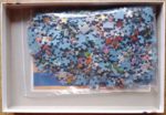 Image of the puzzle 500, Ravensburger, The Christmas Shop, by Janet Kruskamp, Complete, Picture of the bag