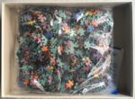 Image of the puzzle 1500, Ravensburger, Going Home, by Anthony Casay, Sealed Bag, Picture of the bag