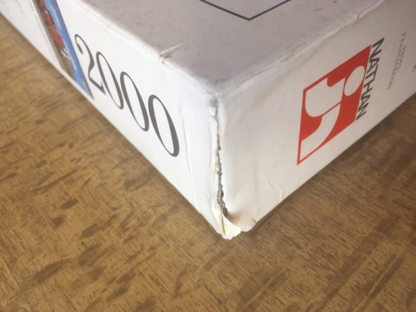 Image of the puzzle 2000, Nathan, Tractor Trailer Truck, by Francis Reyes, Sealed Bag, Picture of the corner