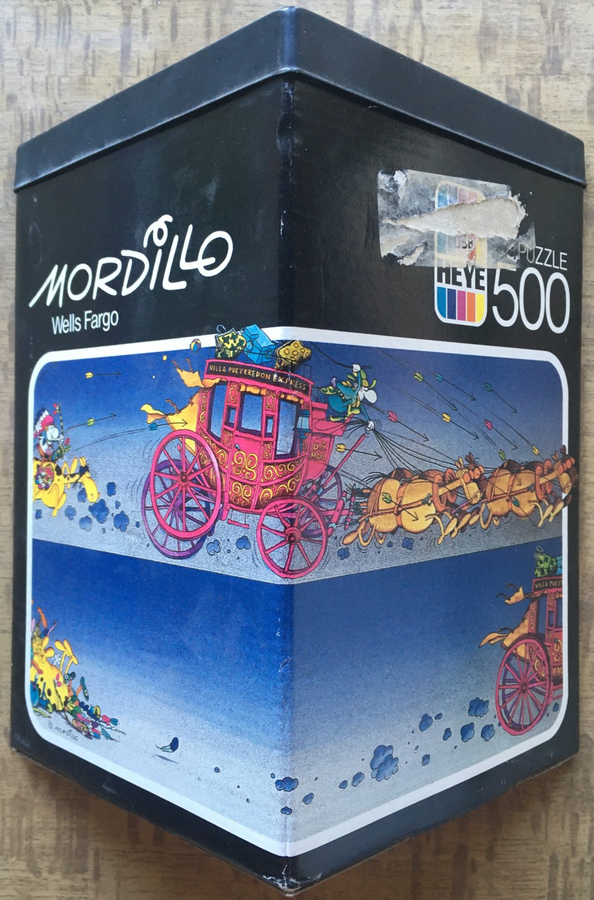 500, Heye, Wells Fargo, by Guillermo Mordillo, Sealed Bag, 2023-12-10 Image of the puzzle 500, Heye, Wells Fargo, by Guillermo Mordillo, Sealed Bag, Picture of the box