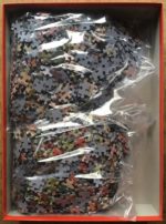 Image of the puzzle 2x1000, Jumbo, Playing School & That's no Catwork, by Cornelis Jetses, Complete, Picture of the bag