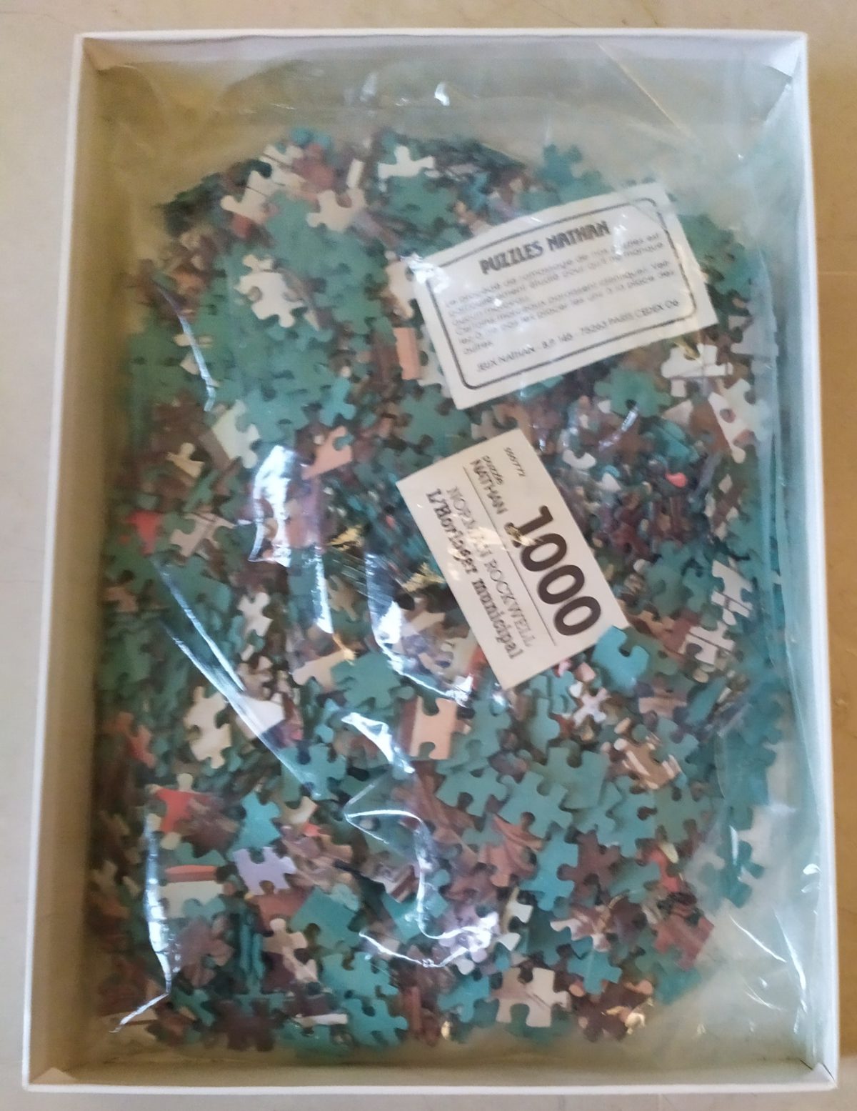 Image of the puzzle 1000, Nathan, The Clock Mender, Norman Rockwell, Sealed Bag, Picture of the bag