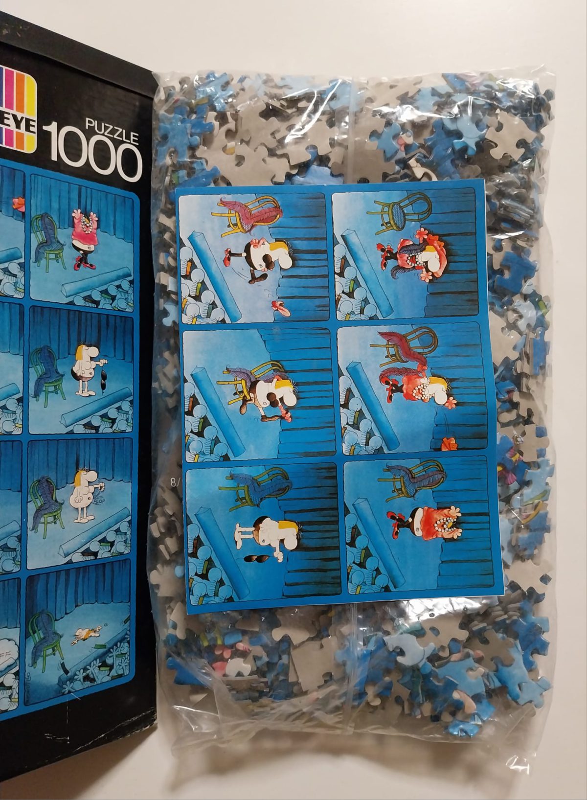 Image of the puzzle 1000, Heye, Striptease, Guillermo Mordillo, Sealed Bag, Picture of the contents