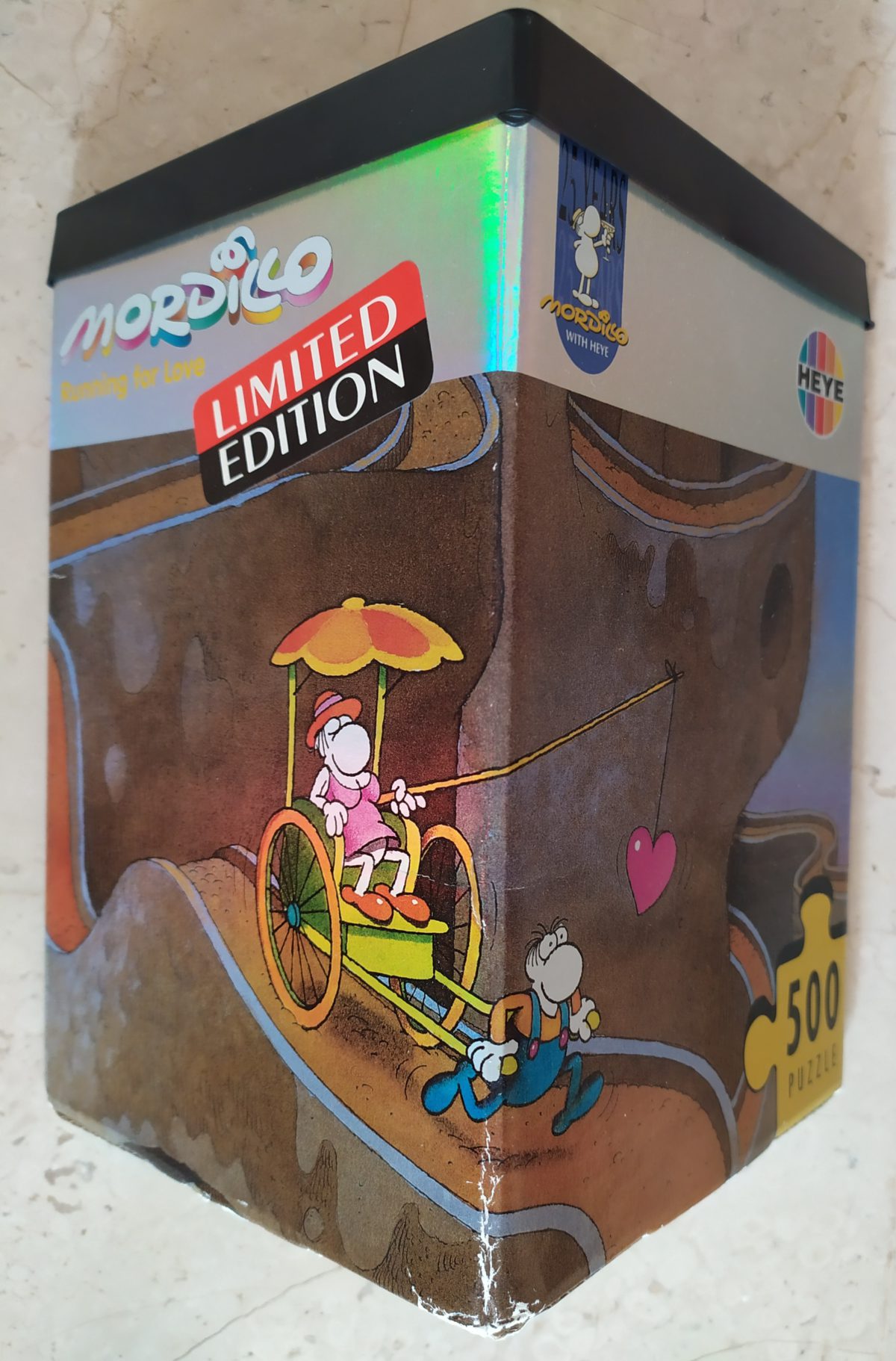 500, Heye, Running for Love, Guillermo Mordillo, Complete, Listed by Barebrain Image of the puzzle 500, Heye, Running for Love, Guillermo Mordillo, Complete, Picture of the box