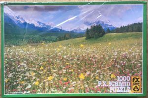 Image of the puzzle 1000, F.X. Schmid, Mountain Meadow, by Manfred Thonig, Factory Sealed, Picture of the box