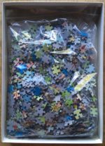 Image of the puzzle 1000, Puzzelman, Grin and Bare it!, by Rooie Oortjes, Complete, Picture of the bag