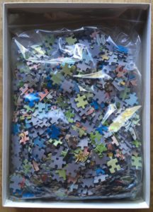 Image of the puzzle 1000, Puzzelman, Grin and Bare it!, by Rooie Oortjes, Complete, Picture of the bag