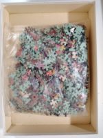 Image of the puzzle 1000, Ravensburger, Meadow Flowers, Sealed Bag, Picture of the bag