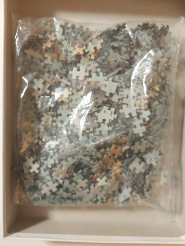 Image of the puzzle 1000, Schmidt, Cat's Eye, Genot, Sealed Bag, Picture of the bag