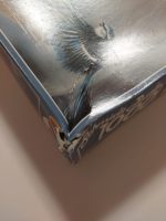 Image of the puzzle 1000, Schmidt, Cat's Eye, Genot, Sealed Bag, Picture of the corner