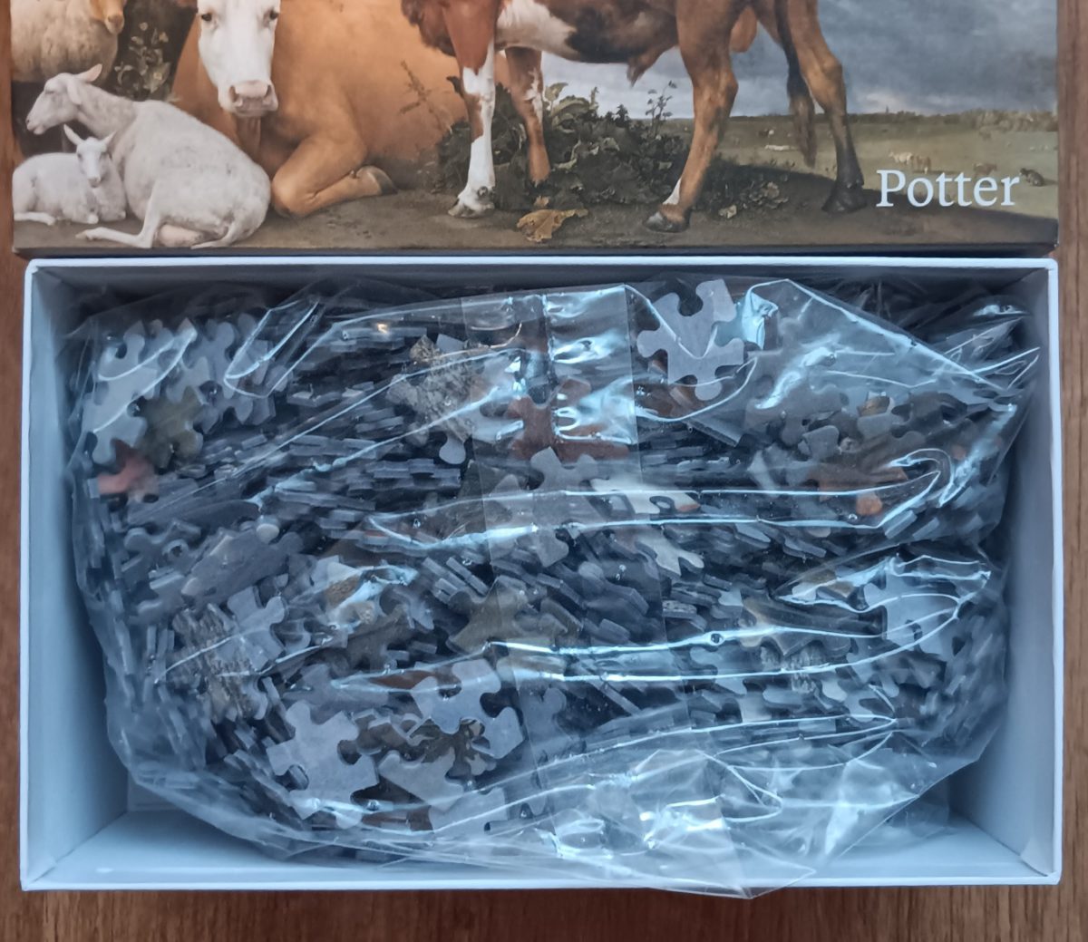 Image of the puzzle 1000, Puzzelman, The Bull, Potter, Sealed Bag, Picture of the bag
