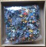 Image of the puzzle 1000, SunsOut, Carousel on the Square, by Susan Brabeau, Complete, Picture of the bag