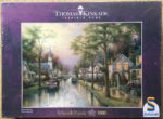 Image of the puzzle 1000, Schmidt, Hometown Morning, by Thomas Kinkade, Factory Sealed, Picture of the box