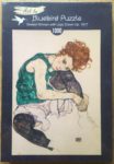 Image of the puzzle 1000, Bluebird, Seated Woman with Legs Drawn Up, by Egon Schiele, Factory Sealed, Picture of the box